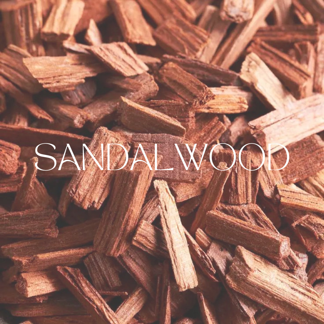 Close-up of dried sandalwood chips with text overlay – natural source of sandalwood oil used in perfumes and skincare